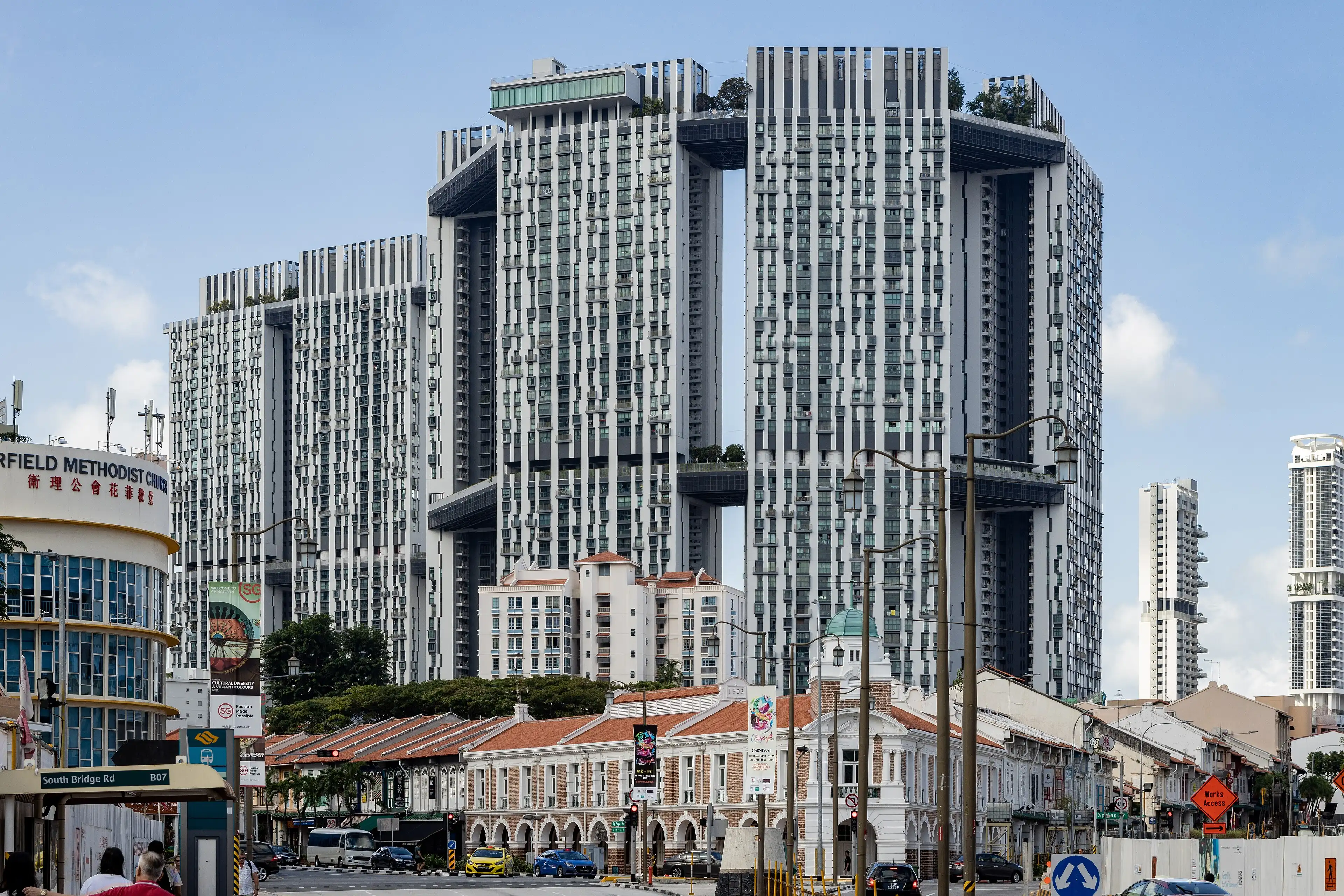 The Pinnacle@Duxton public housing towers above the shophouses of Tanjong Pagar.